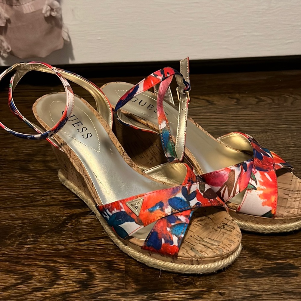 Guess flower patterned wedges. Size 7.5